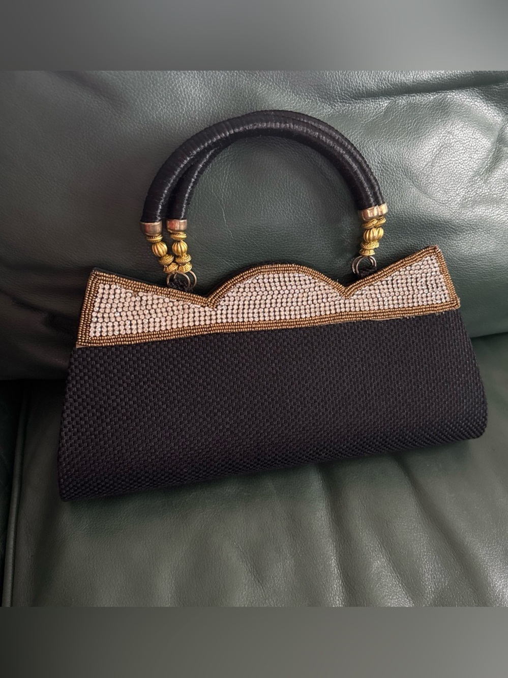 Elegant Black Handbag with Gold Beaded Accent